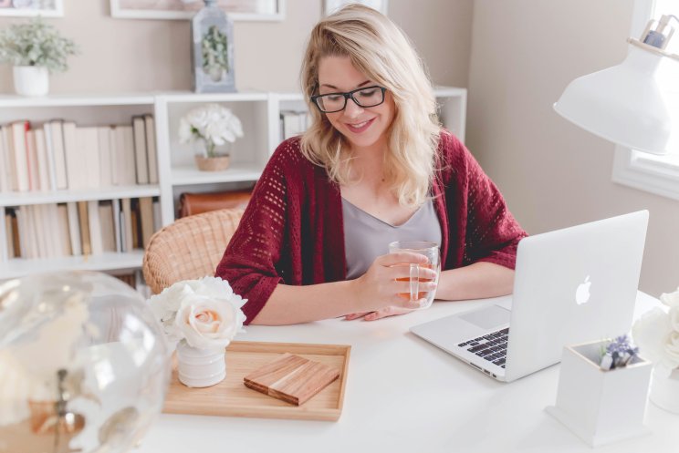 Lady with glasses booking online